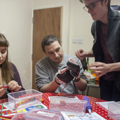 Using goalkeeper gloves to limit fine motor skills